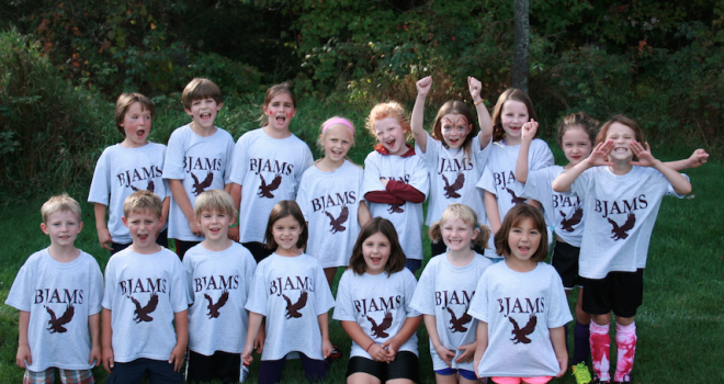 First and second grade soccer team at All Saints Catholic Academy